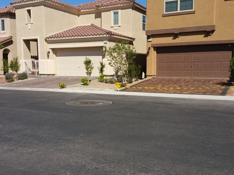 Sealed next to unsealed paver driveway